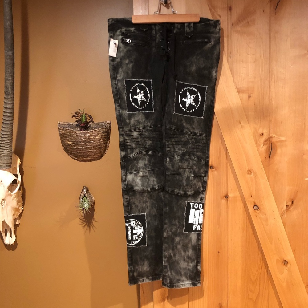 Distressed moto jeans